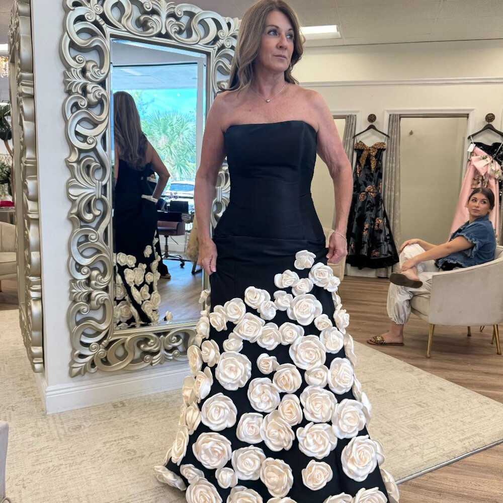 Black gown size 6 with gorgeous flowers